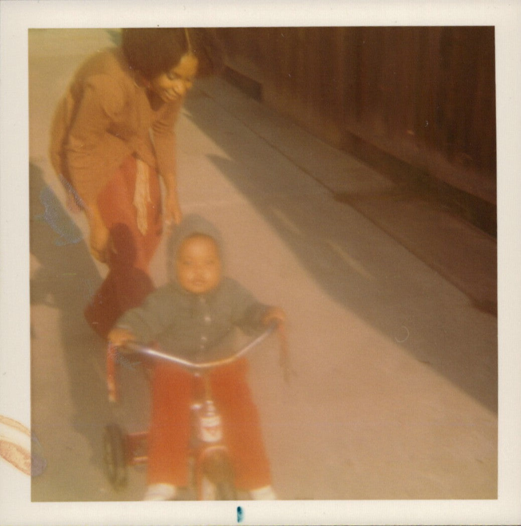 Vintage photo of Myshjua Murray as a child with her mother, celebrating generational Black entrepreneurship