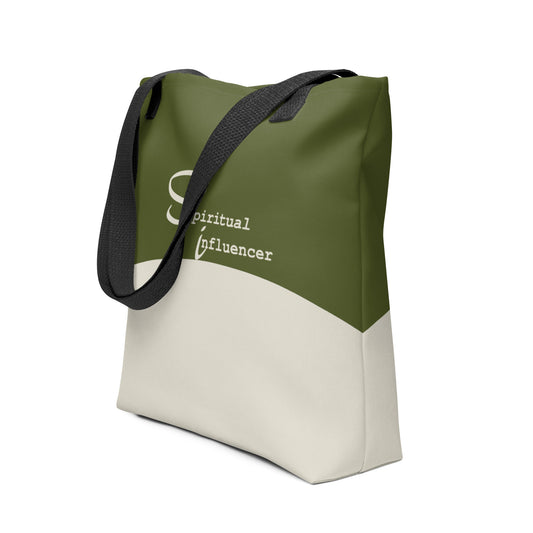 Angled view of the Spiritual Influencer Core Tote featuring olive and sand curved design with black straps.”